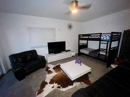 Patuiset Island, Pocasset  Cape Cod vacation rental - Bedroom 5/1st flr family room Bunk beds &amp; couch 50in Flat Screen