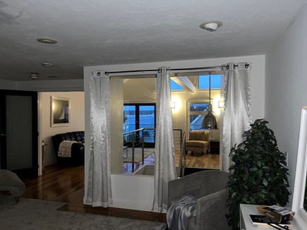 Patuiset Island, Pocasset  Cape Cod vacation rental - Master facing glass wall.