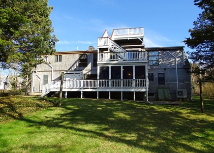 Eastham Cape Cod vacation rental - Back of house showing both decks and screened porch