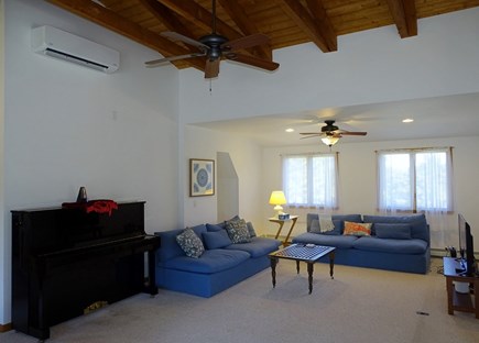 Eastham Cape Cod vacation rental - Upstairs TV room with couches, piano, game area
