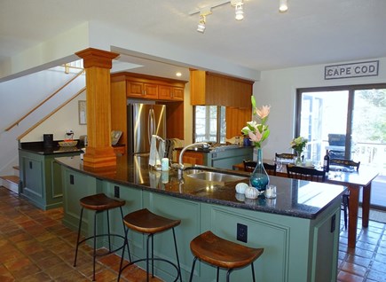 Eastham Cape Cod vacation rental - Kitchen offers slider to deck and porch, breakfast bar seating 