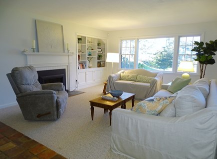 Eastham Cape Cod vacation rental - Sunny living room with Bay window and gas fireplace