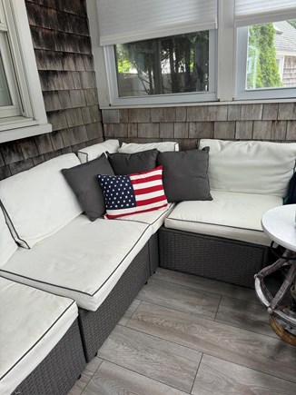 Harwich Port Cape Cod vacation rental - Sofa in porch to enjoy setting sun in late afternoon