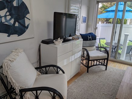 Harwich Port Cape Cod vacation rental - Living room with sliders to patio
