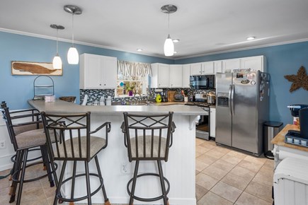 Sagamore Beach Cape Cod vacation rental - A kitchen island with seating for four