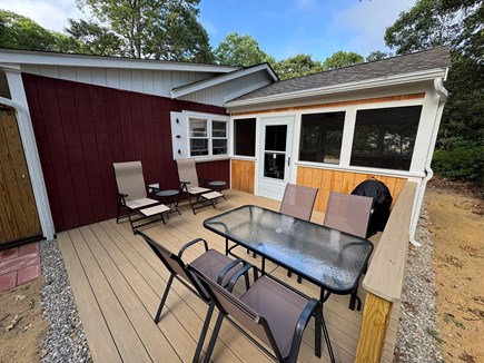 Eastham Cape Cod vacation rental - New summer 2025: deck with grill, dining table and recliners