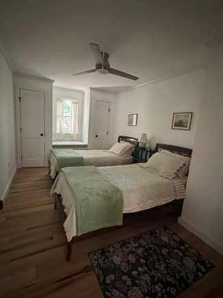 Eastham Cape Cod vacation rental - Second bedroom - two twin beds, two closets, window seat.