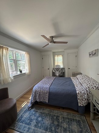 Eastham Cape Cod vacation rental - Primary bedroom. Queen size bed. Two closets. Work station.