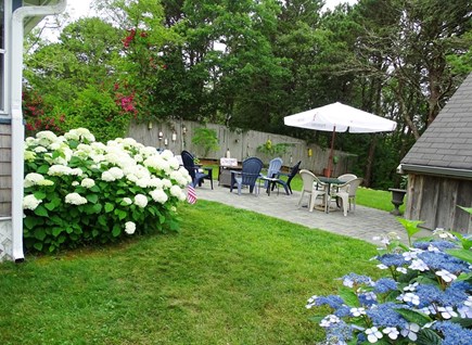 Chatham Cape Cod vacation rental - Private fenced yard with plenty of seating