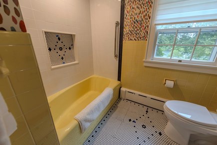 Falmouth Cape Cod vacation rental - Guest bath with tub and shower.