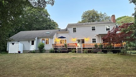 Falmouth Cape Cod vacation rental - Large deck and outdoor shower provide views of Jones Pond.