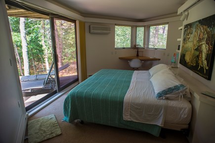 Wellfleet Cape Cod vacation rental - Bedroom 3 with King bed,  WI closet, workspace, and deck.