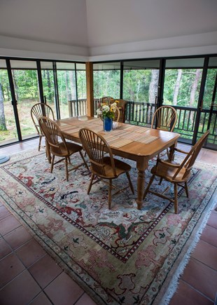 Wellfleet Cape Cod vacation rental - Screened-in dining room.  Table opens to comfortably  seat 12,