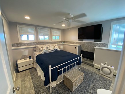 Plymouth MA vacation rental - Primary Bedroom - TB, Fireplace, A/C, Bath & Closet