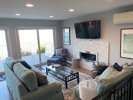 Plymouth MA vacation rental - Living room - open to Kitchen. Smart TV, Fireplace & A/C.