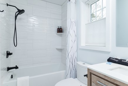 West Yarmouth Cape Cod vacation rental - First floor bathroom with bathtub/shower