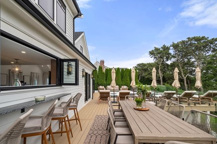 Chatham Cape Cod vacation rental - Pass through window with bar and dining area