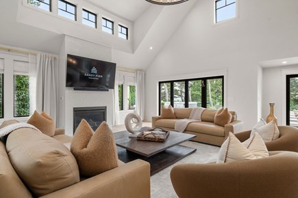 Chatham Cape Cod vacation rental - Italian leather couches with 75 inch TV and gas fire place