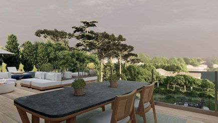 Chatham Cape Cod vacation rental - Dining table next to outdoor kitchen