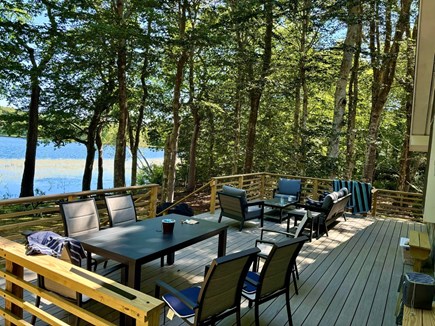 East Harwich Cape Cod vacation rental - Spacious backyard deck overlooking the pond