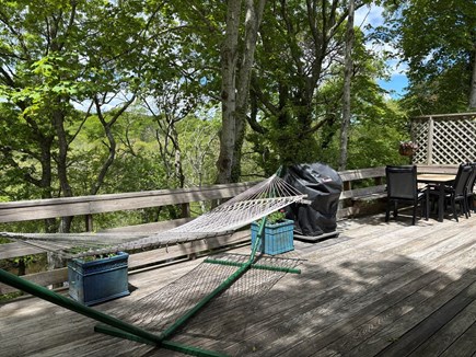 East Falmouth Cape Cod vacation rental - Large deck with hammock, BBQ grill, and outdoor dining area