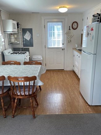 Dennis Port Cape Cod vacation rental - Kitchen with new refrigerator, gas stove, microwave, toaster oven