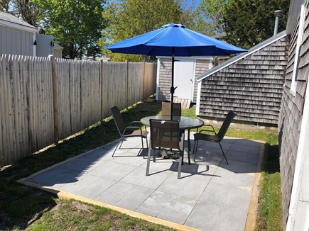 Dennis Port Cape Cod vacation rental - Private backyard <br/>patio table & chairs <br/>weber gas grill<br/>