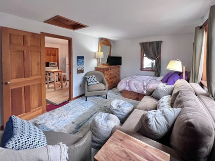 ORLEANS Cape Cod vacation rental - Sleeping and Living Space with Kitchen in the Background