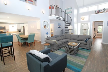 Chatham Cape Cod vacation rental - Family room with dining room and kitchen to the left