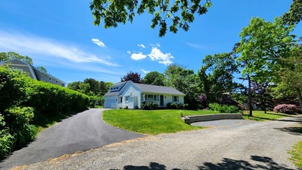 E. Sandwich Beach Cape Cod vacation rental - Front yard with garage for storing bikes and other items