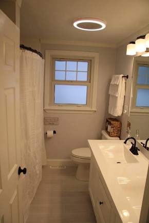 E. Sandwich Beach Cape Cod vacation rental - Downstairs full bathroom with shower/tub
