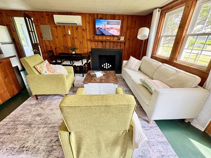 Dennis Cape Cod vacation rental - Living room with wall mounted smart tv.