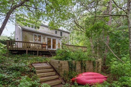 West Yarmouth, off Buck Island Cape Cod vacation rental - House from wooded trail to Horse Pond.