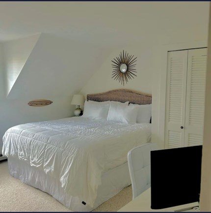 Harwich Cape Cod vacation rental - Master bedroom with TV + desk  bureau + closet