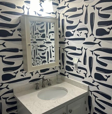 Harwich Cape Cod vacation rental - Half bath with washer + dryer