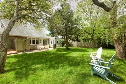 Hyannis Cape Cod vacation rental - Large Fenced in Backyard with Shower, Patio, and Grill