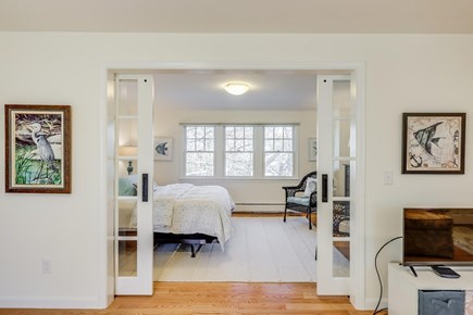 Sandwich Downs, East Sandwich Cape Cod vacation rental - Second floor sitting area peeking into queen bedroom
