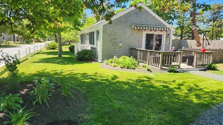 South Yarmouth Cape Cod vacation rental - Landscaped yard with Deck and new patio