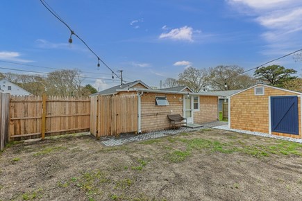 West Yarmouth Cape Cod vacation rental - Fenced Backyard