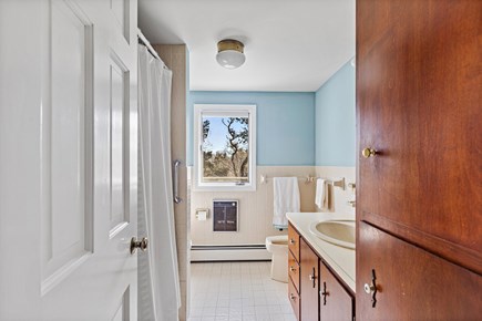 Orleans, Saltwater Serenity Cape Cod vacation rental - Bathroom located on main level with bathtub
