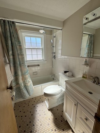 Falmouth Cape Cod vacation rental - First floor bathroom with tub & shower