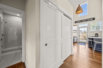 East Orleans Cape Cod vacation rental - Hallway to bedrooms - laundry closet
