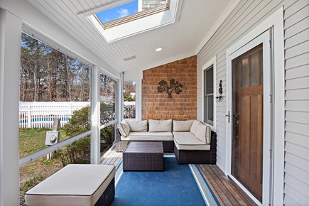 Eastham Cape Cod vacation rental - Sunroom with pool view and 40 TV. Lovely space to relax