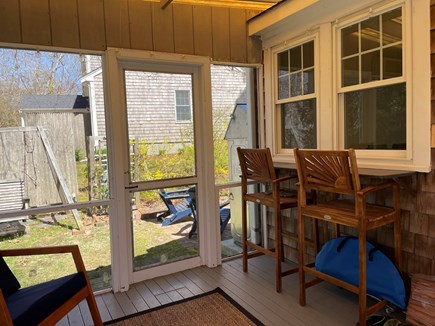 Harwich  Cape Cod vacation rental - Screened in porch leading to patio area