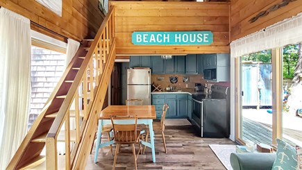 Wellfleet Cape Cod vacation rental - Living room with stairs to second floor open loft