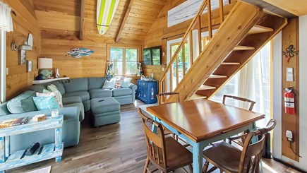Wellfleet Cape Cod vacation rental - Kitchen and dining area with living room beyond
