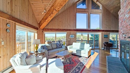 Wellfleet Cape Cod vacation rental - Main living area has large windows, sliders and soaring ceiling