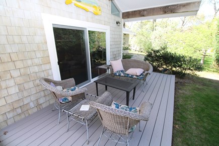 Dennis Cape Cod vacation rental - shaded outdoor space off primary bedroom