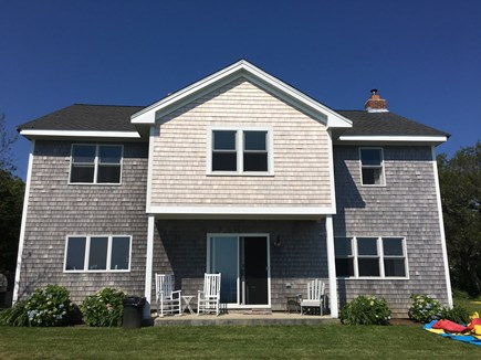 Manomet, Plymouth Manomet vacation rental - Back of the house, small sitting porch with ample backyard space