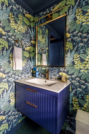 Harwich Cape Cod vacation rental - 1/2 bath adjacent to media room.